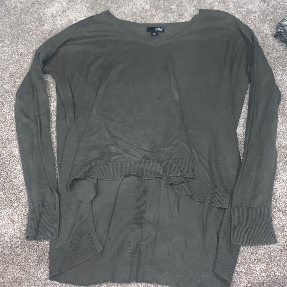 Green long-sleeve shirt.